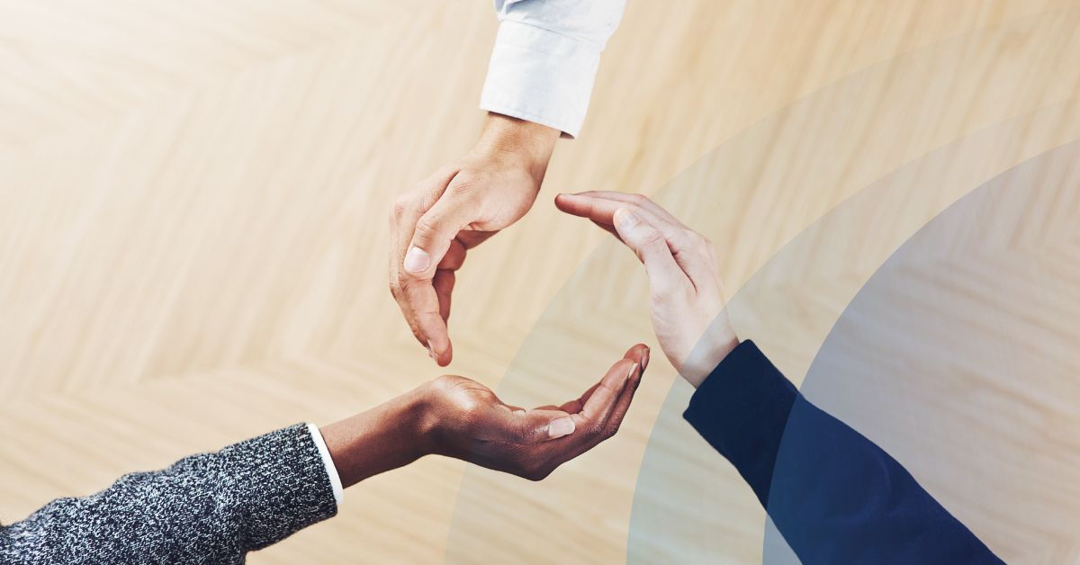 Three hands signifying employee lifecycle driven by behavioral assessments.