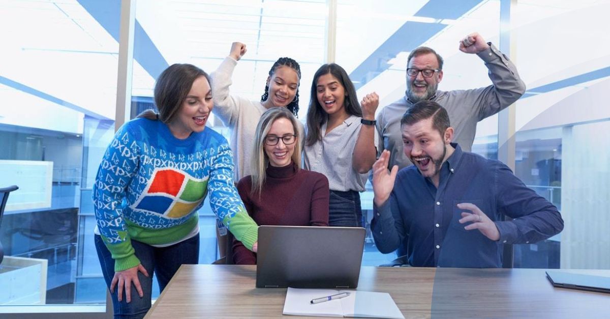 Vibrant team looking at the behavioral assessments outcomes on a laptop.
