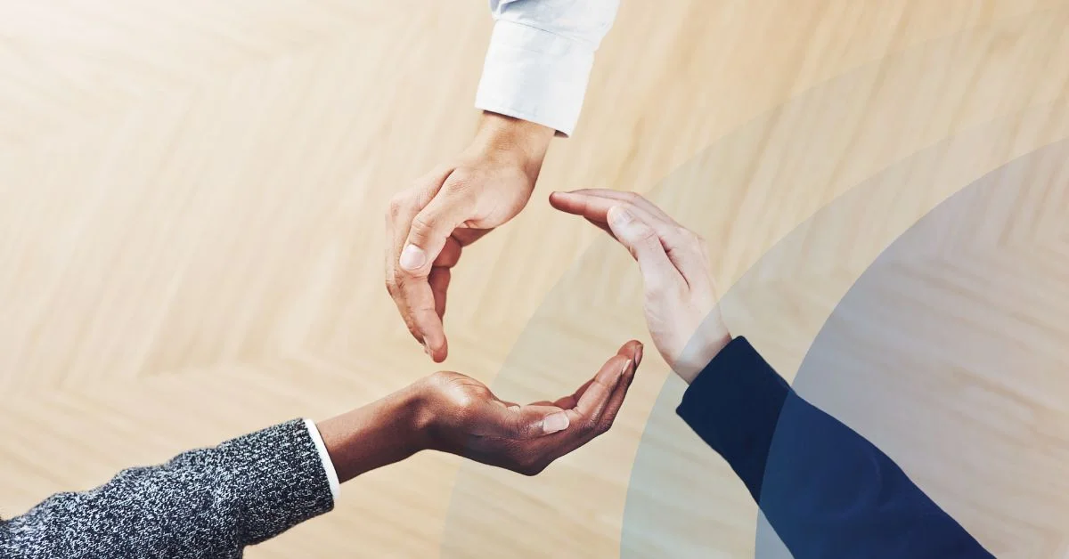 Three hands signifying employee lifecycle driven by behavioral assessments.